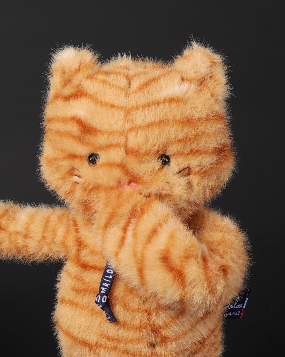 Peluche chat qui se marre