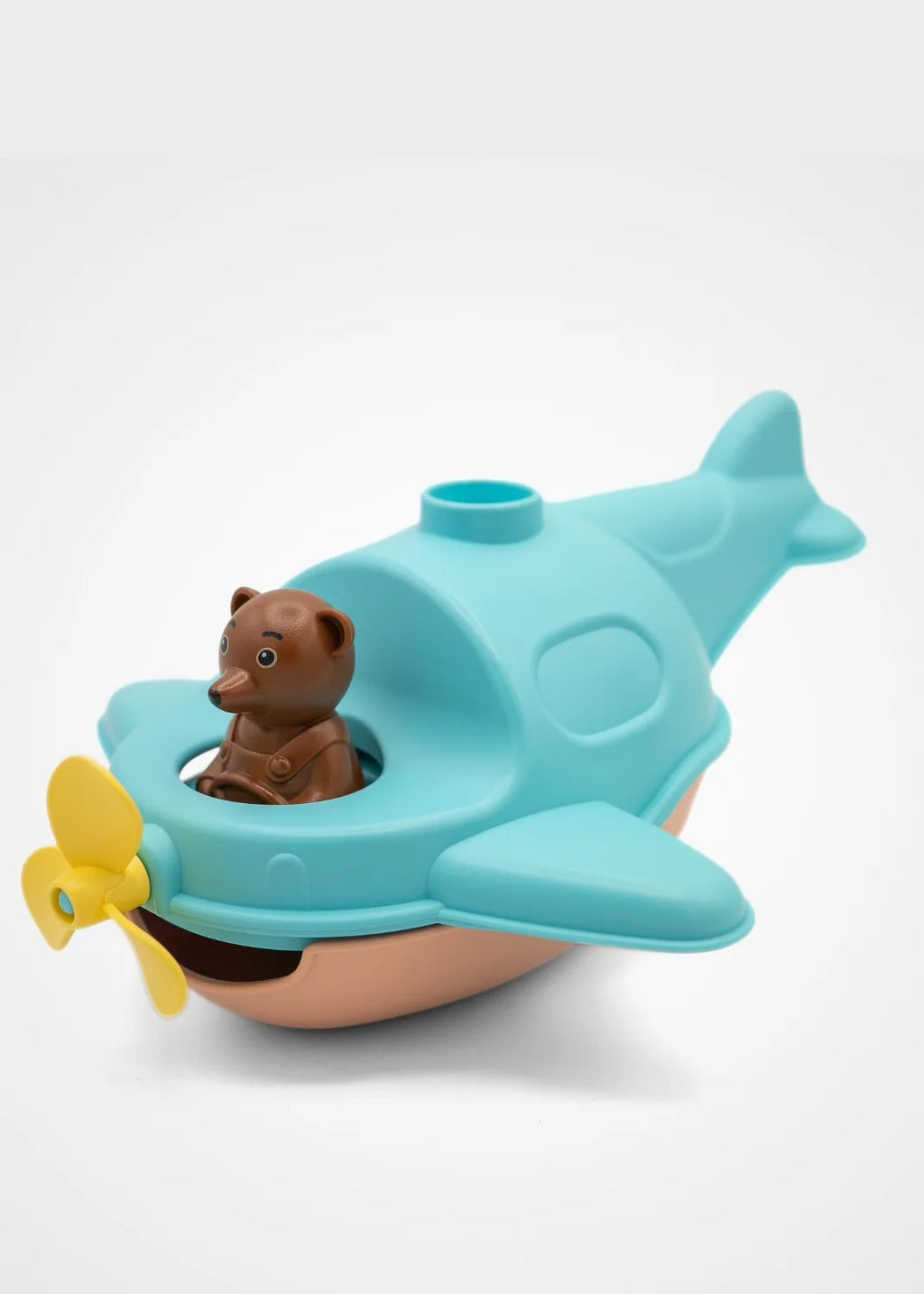 enfant jouant avec un jouet de bain hydravion Petit Ours Brun fabriqué en France